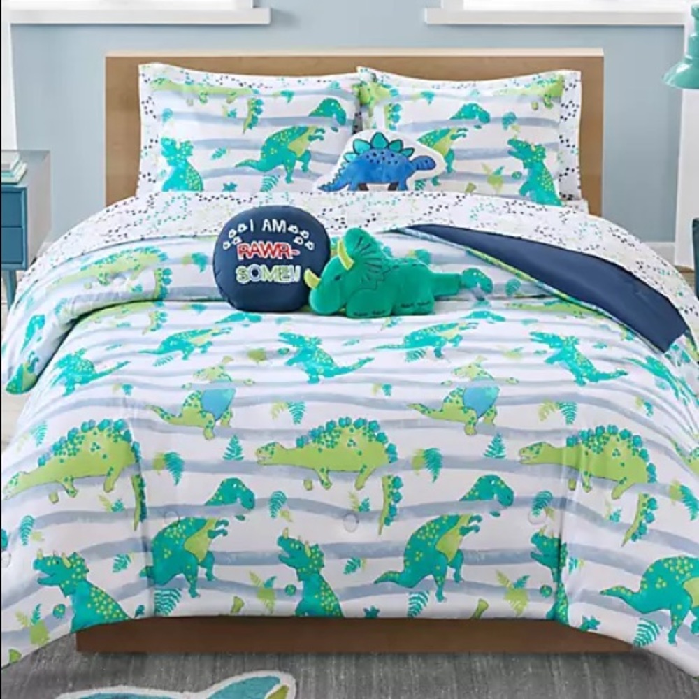 Lighting Bug Dinosaur comforter and sheets.